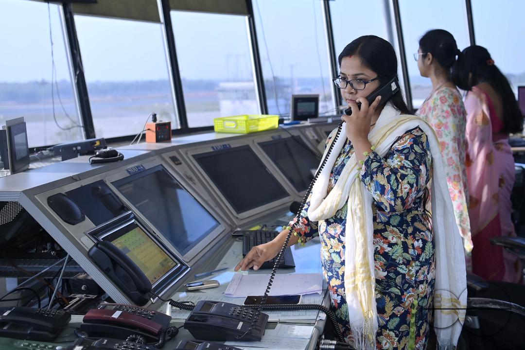 Female traffic controllers, Bipasha Hrangkhawl, Disha Chandra, and Chaya, take charge of traffic management at the Agartala airport's ATCT Tower to celebrate International Women's Day