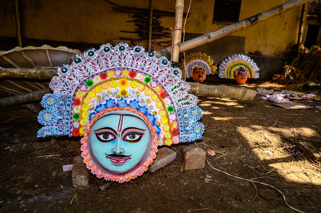 A village idol artist makes large color masks modeled after Purulia Chhau dance masks (Purulia Chhau dance is listed on UNESCO's World Heritage list of dances) of goddesses, animals, and rakshasas (humanoid demons or unrighteous spirits) like Hindu mytho