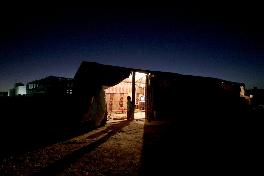 Photo story - Abu Mohammad and His family - the relationships between a poor family how they live.