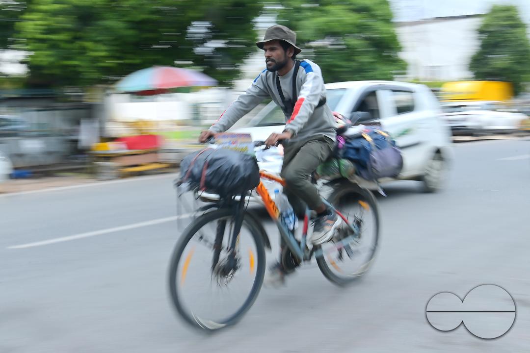 Sampoorn Shukla, a 23-year old Radio Jockey from Ashiyana, Lucknow, seen riding a bicycle during his India tour with the theme âJoin humanity save nature," in Agartala