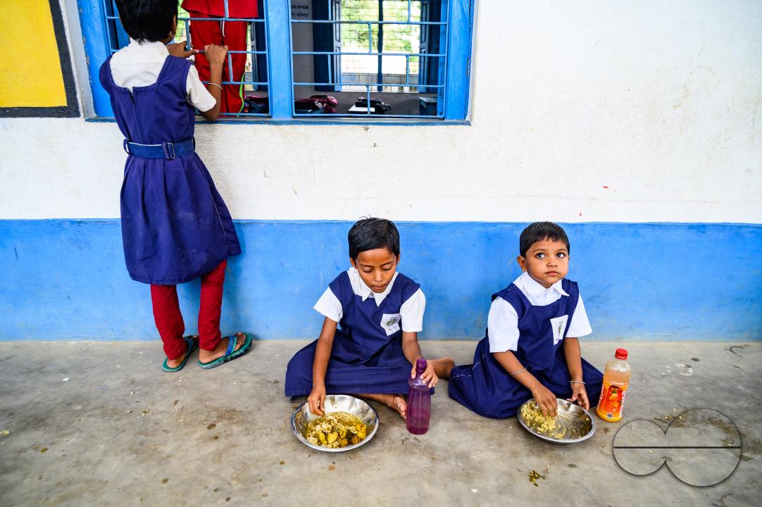 The mid-day meal scheme is a school meal program of the Government of India designed to better the nutritional standing of school-age children nationwide