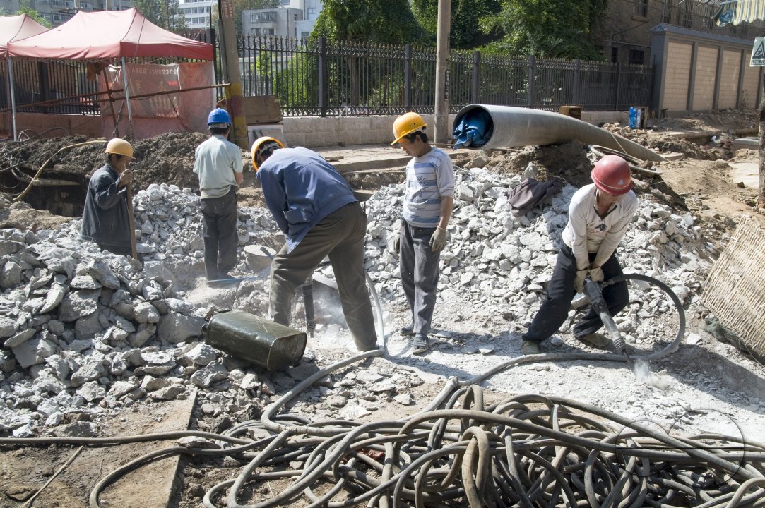 CHINA Migrant workers from the countryside working in construction in Kunming, Yunnan province.