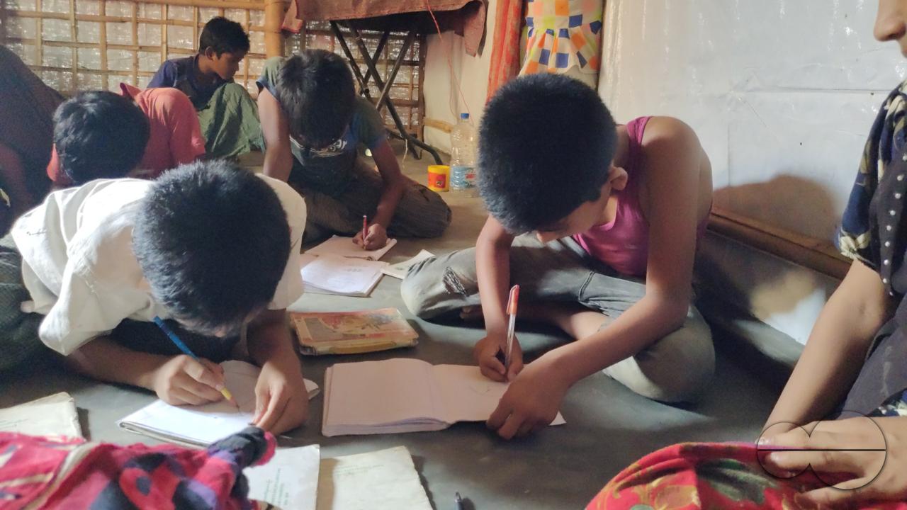 Children been educated at makeshift classroom at the Balukhali refugee camp