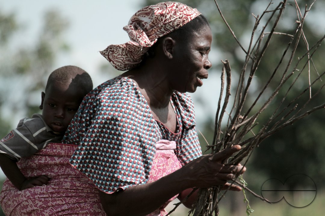 An internally displaced grandmother woman, who lost her husband to attacks from Boko Haram, gathers