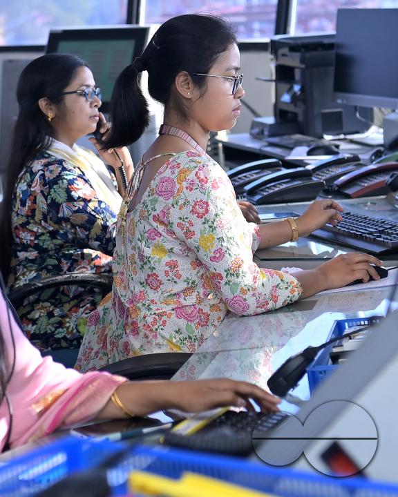 Female traffic controllers, Bipasha Hrangkhawl, Disha Chandra, and Chaya, take charge of traffic management at the Agartala airport's ATCT Tower to celebrate International Women's Day