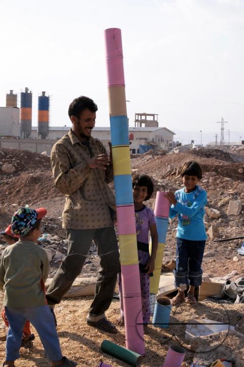 Photo story - Abu Mohammad and His family - the relationships between a poor family how they live.