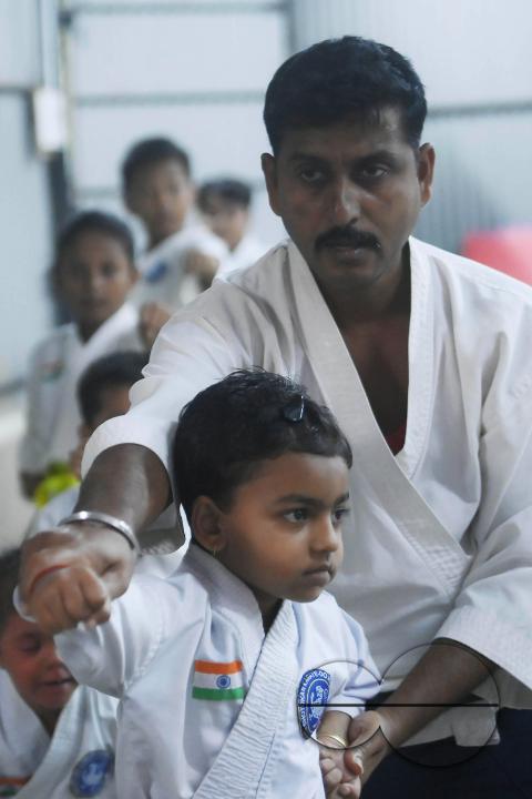 Children, who are students of the "Shotokan Karate-Do Association of Tripura", are seen performing karate during a special class on Children's day in Barjala, at Agartala