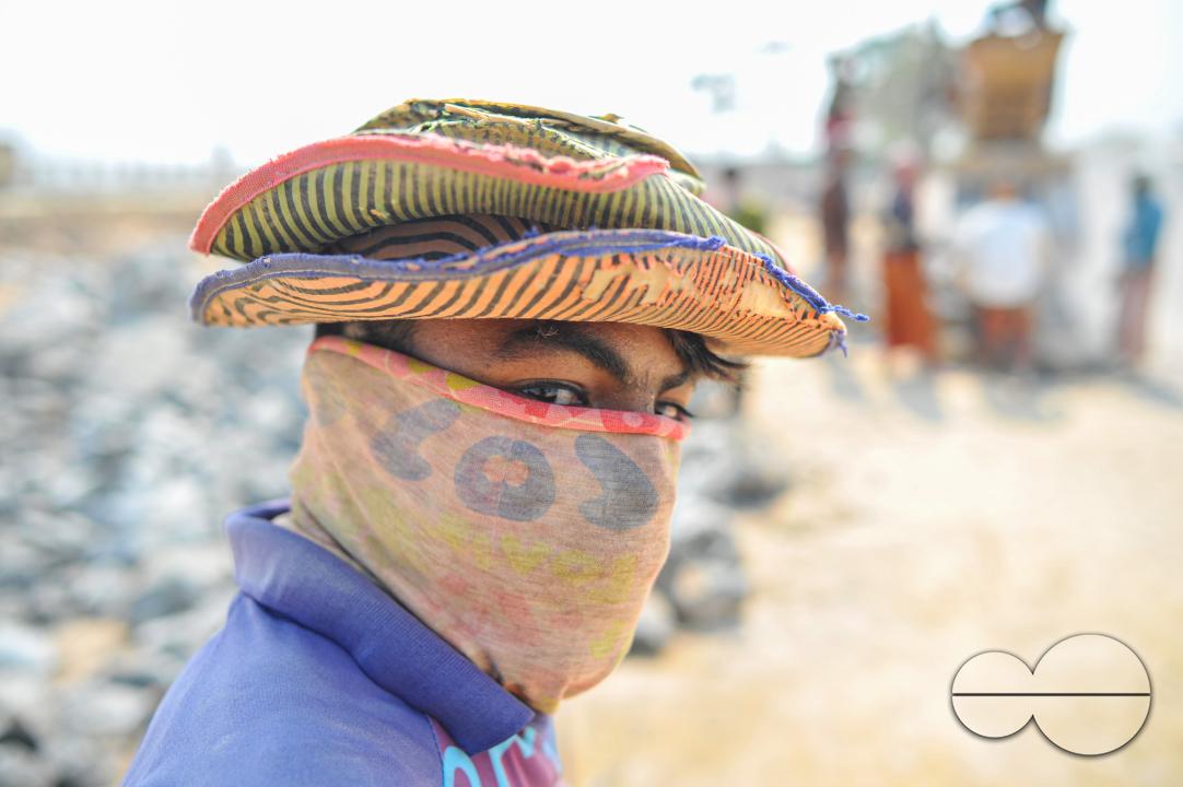 Male and female workers are breaking LC stones with a crusher machine in Bholaganj area, known as the 'Stone State' of Sylhet Companyganj Upazila