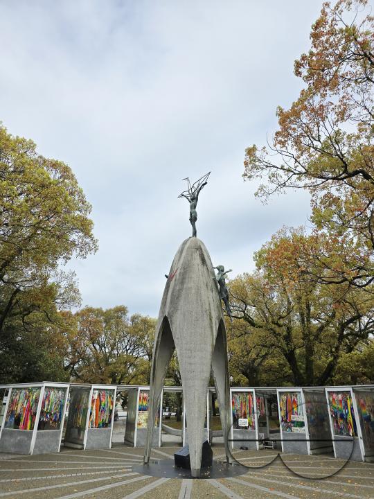 Childrenâs Peace Monument in Hiroshima, also known as the "Atomic Bomb Children Statue", is a monument for peace to commemorate Sadako Sasaki and the thousands of child victims of the atomic bombing of Hiroshima