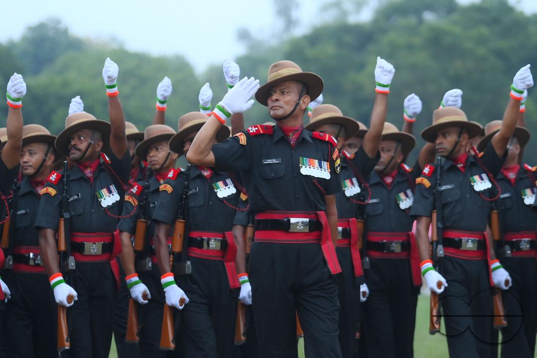 Soldiers of different platoons at the 77th Independence Day parade at the Assam Rifles ground in Agartala