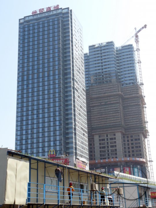 CHINA Migrant workers' temporary accomodation during construction of office blocks in Xiamen in Fujian province.
