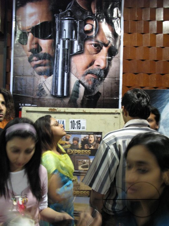 INDIA.People during an interval at the Regal Cinema in Mumbai.