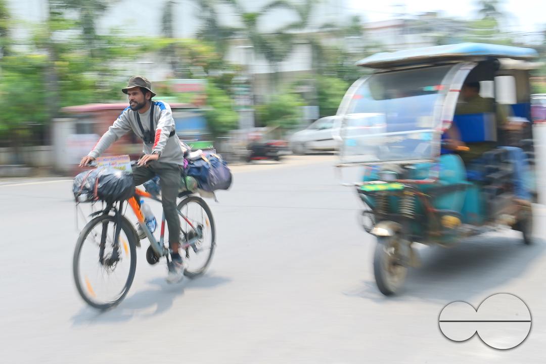 Sampoorn Shukla, a 23-year old Radio Jockey from Ashiyana, Lucknow, seen riding a bicycle during his India tour with the theme âJoin humanity save nature," in Agartala