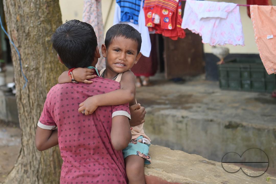 Brothers at a temporary relief camp at Pratapgarh English Medium School in Agartala