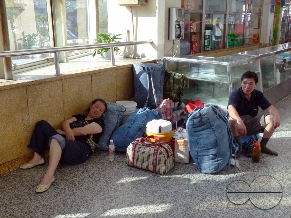 CHINA Migrant workers waiting for train to return to their provinces during Spring holidays. Xiamen, Fujian..
