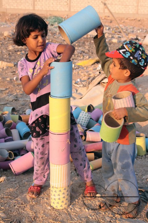 Photo story - Abu Mohammad and His family - the relationships between a poor family how they live.