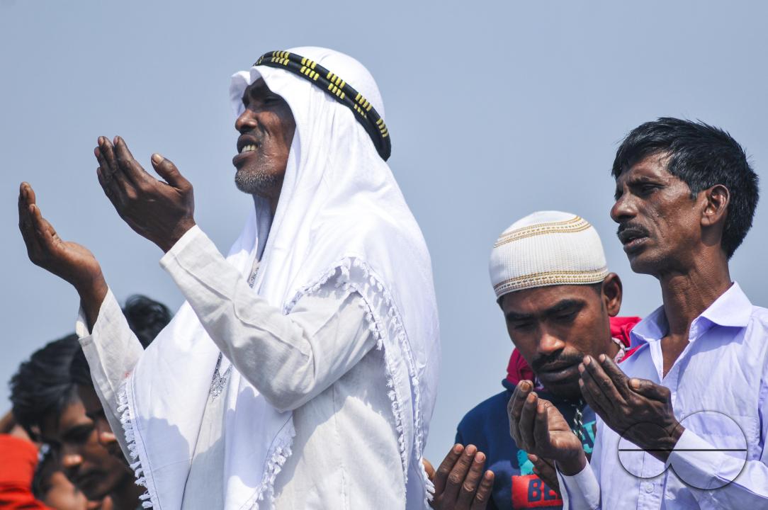 Muslim devotees offer prayers at the Akheri Munajat or final prayers during the Biswa Ijtema 2nd phase, an annual congregation of Muslims in Tongi, the outskirts of Dhaka, Bangladesh.