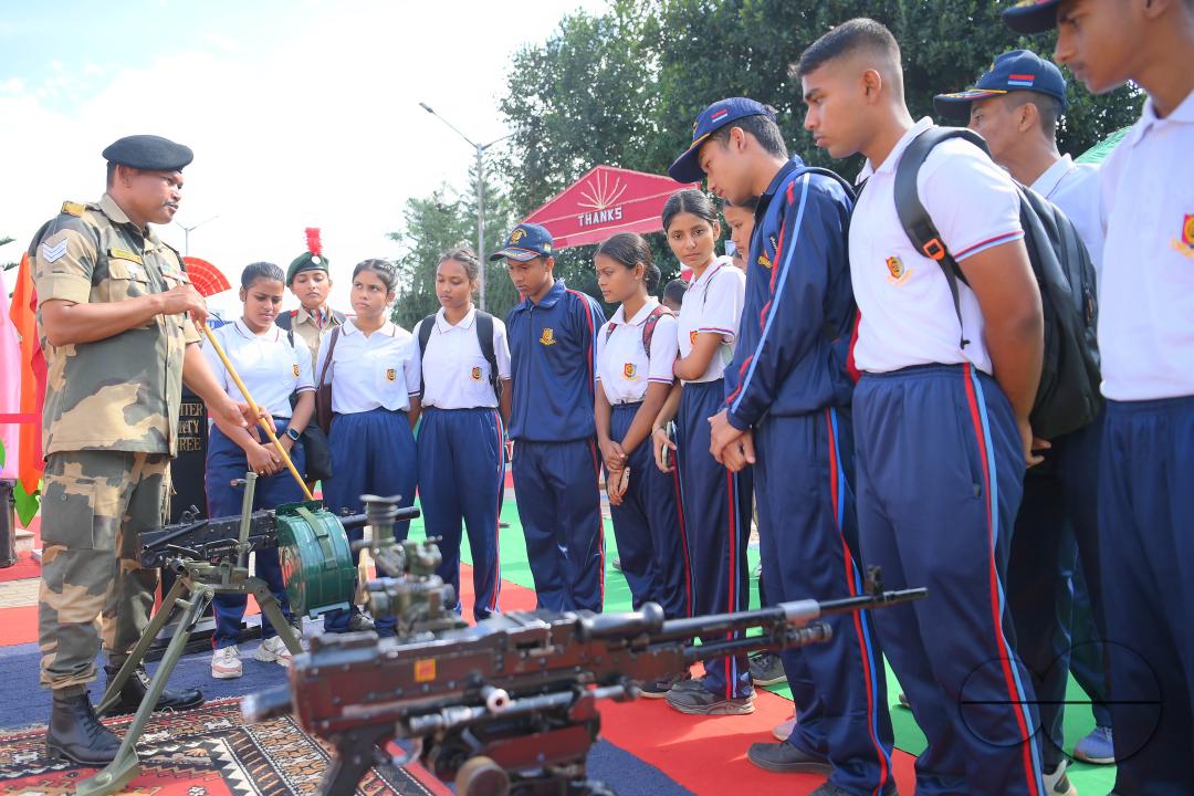 Students at Tripura University are attending a weapon display organized by the 43rd Battalion of the Border Security Force (BSF), Gokulnagar, Sepahijala, on the occasion of the 60th BSF Raising Day at Tripura University
