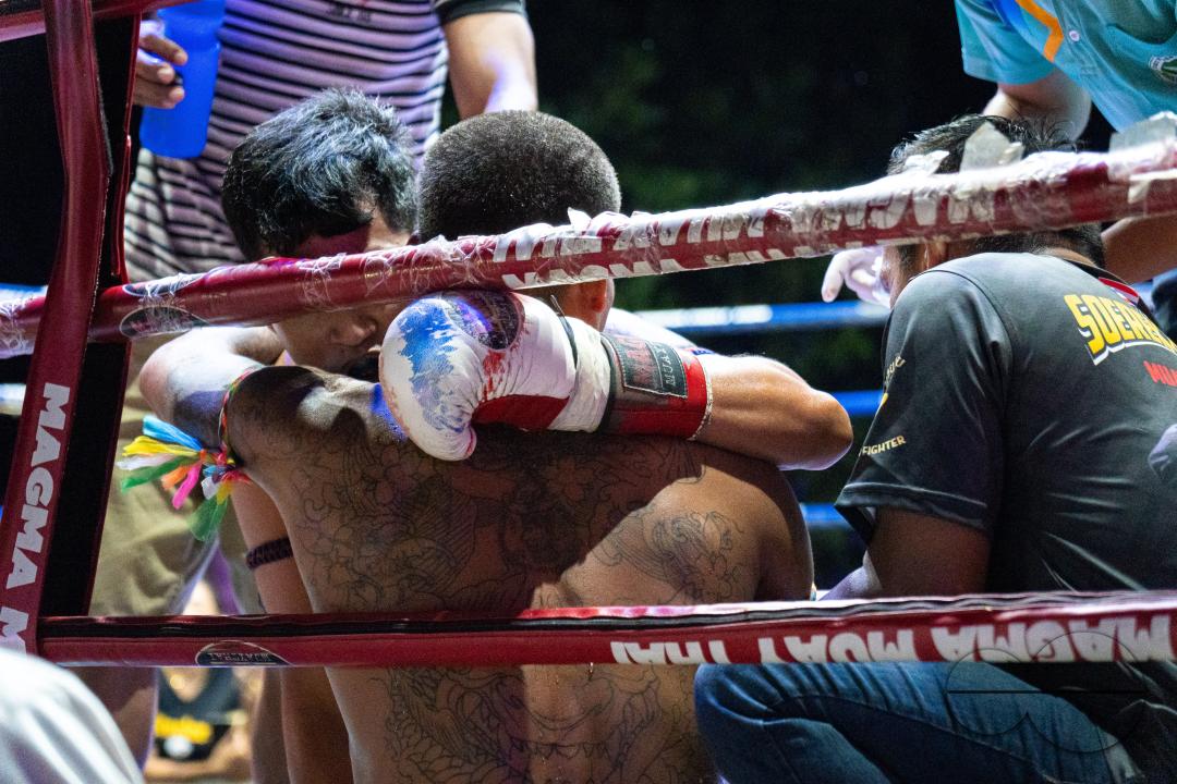 The winning boxer Frame Paya (L), embraces his opponent Petch Si Nel (R) after knocking him out, during the Muay Thai Fights, on Koh Chang Island, Thailand.