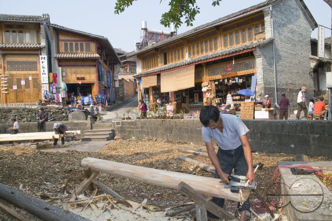 CHINA Migrant workers from the countryside working in construction and restoration at a village in Yunnan province.