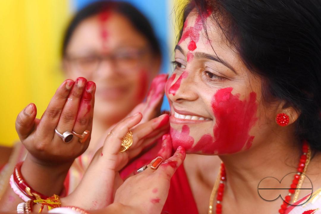 Married ladies smear red Sindoor or Vermillion, a ritual known as Sindur Khela or Vermillion Game on Vijayadashami, the last day of the Durga Puja festival