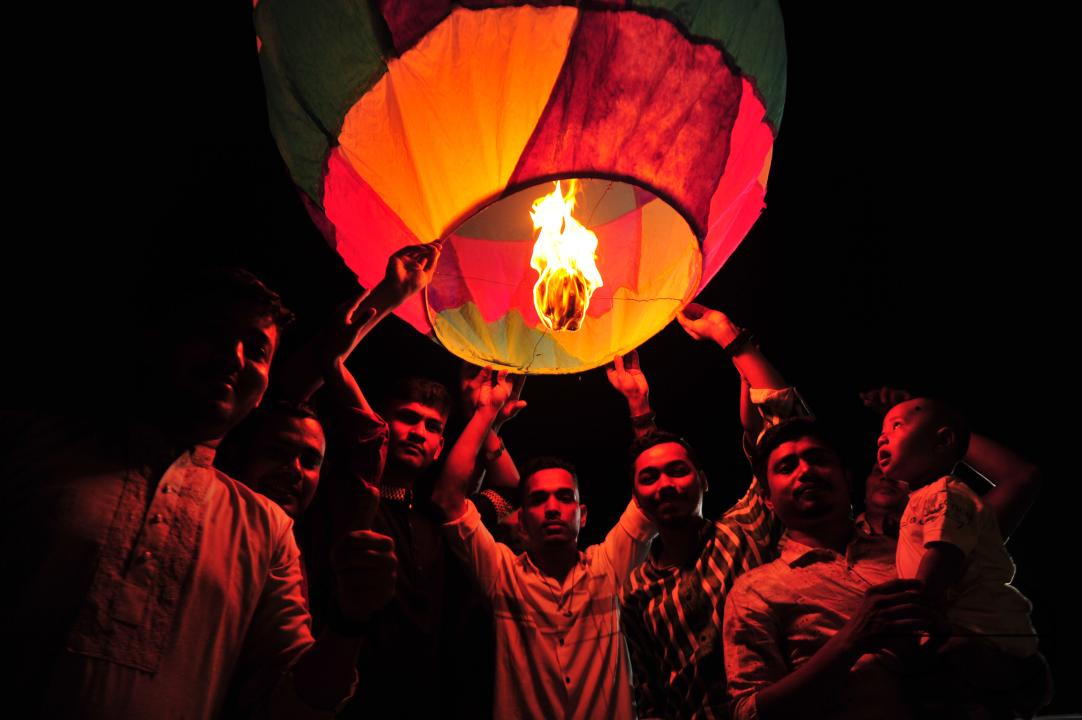 Buddhists religious followers are lighting fire sparks to celebrate Prabarana Purnima 2023 at Buddhist temples in Sylhet
