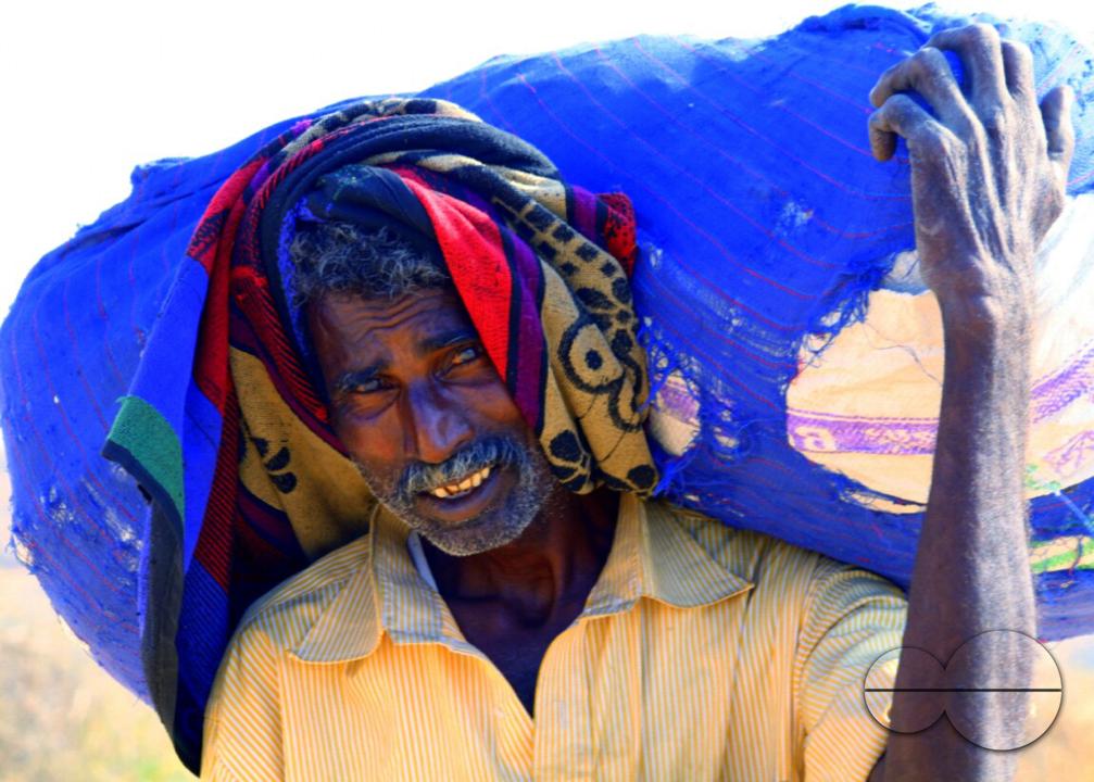 Portrait of a farmer during a hard day's work at a rural village