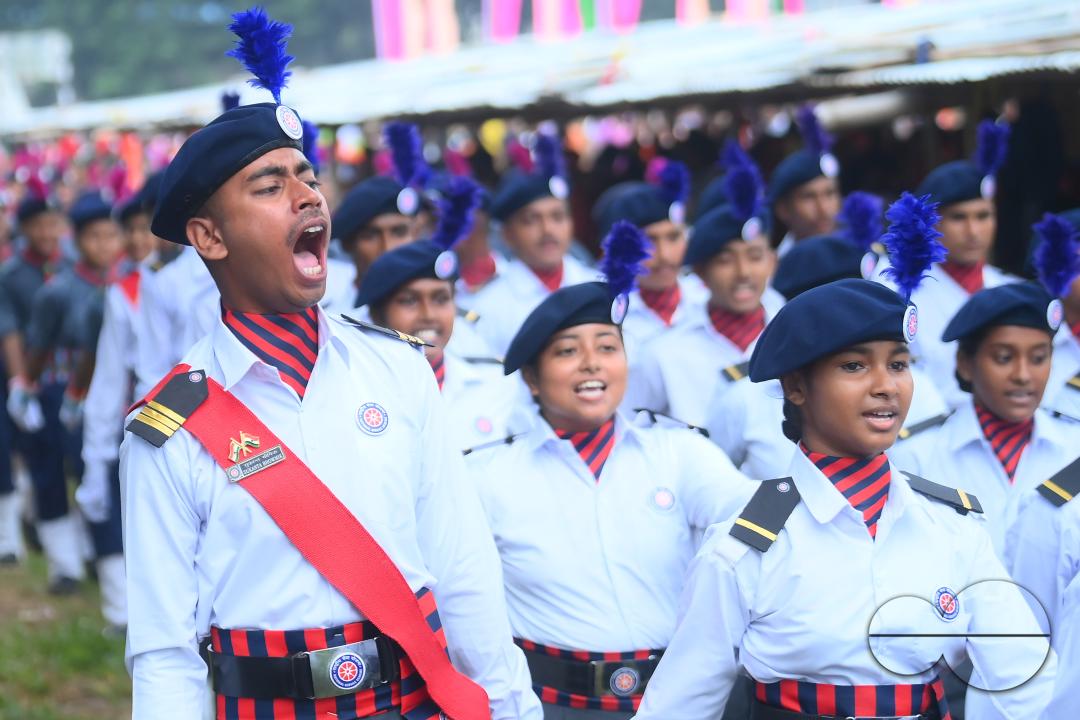 Soldiers of different platoons at the 77th Independence Day parade at the Assam Rifles ground in Agartala