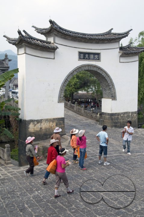 CHINA Chinese tourists visiting a traditional village in Yunnan province.