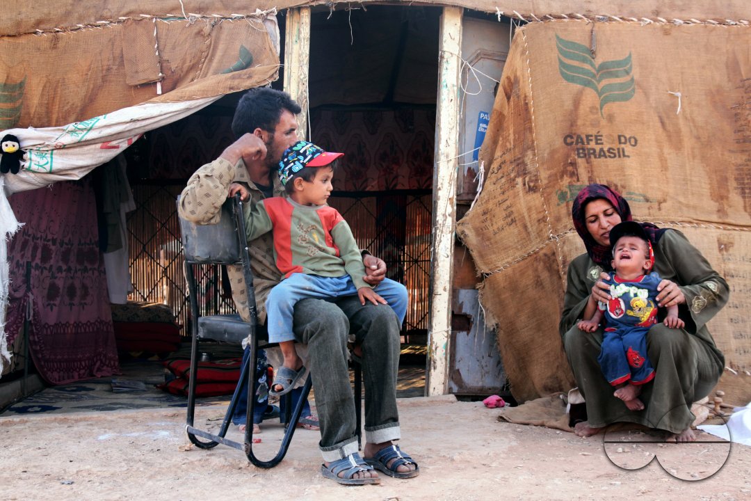 Photo story - Abu Mohammad and His family - the relationships between a poor family how they live.