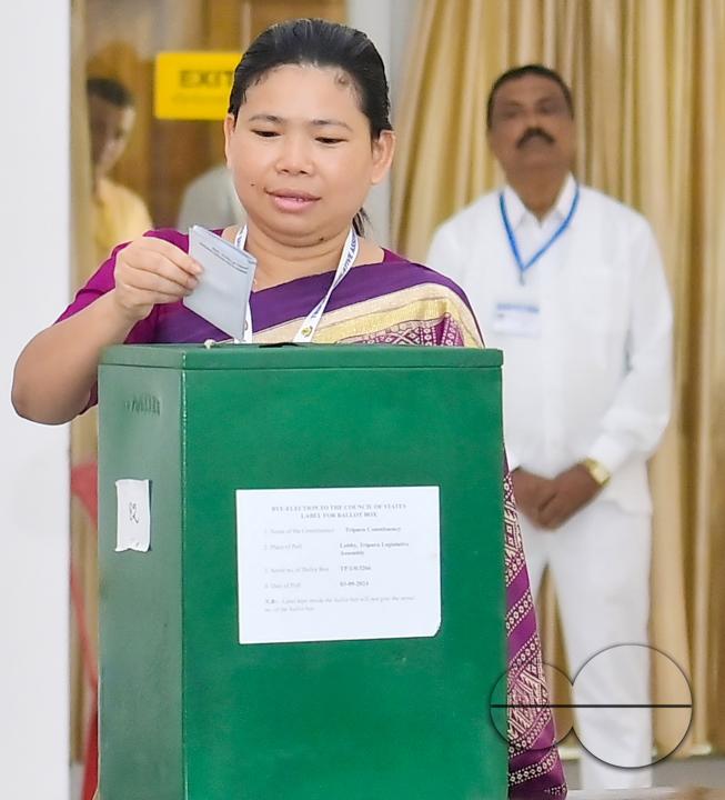 Minister of industries and commerce, Santana Chakma casting her vote during the by-election to the Council of States (Rajya Sabha) at the Secretariat in Agartala
