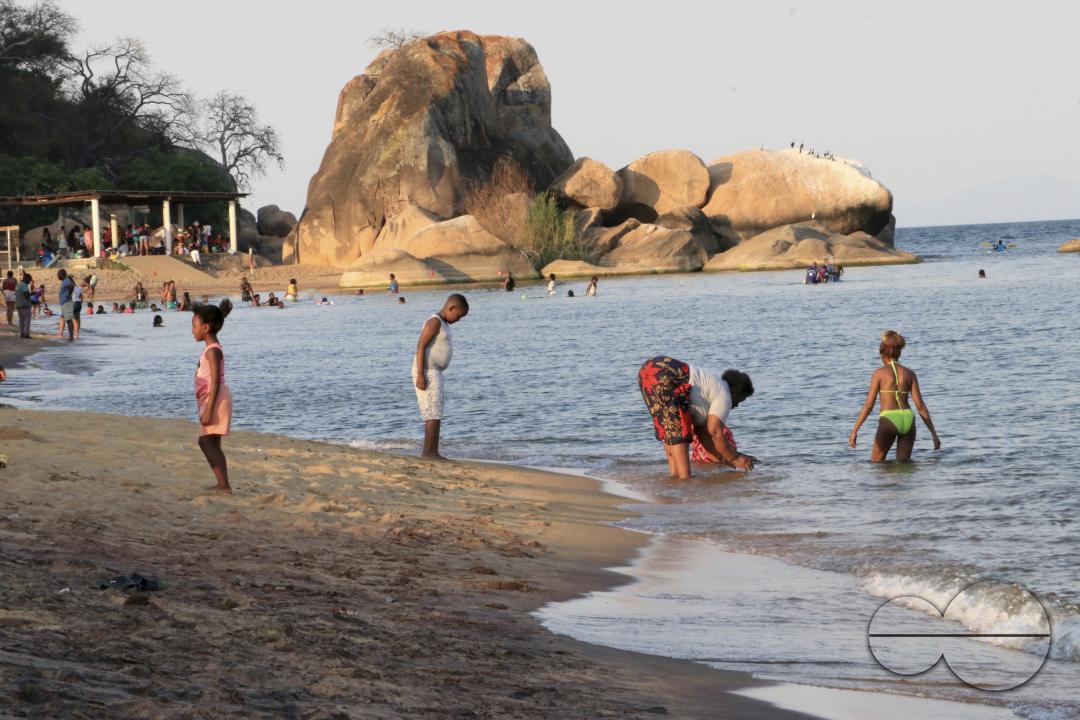 Visitors are seen enjoying themselves at Senga Bay, Salima