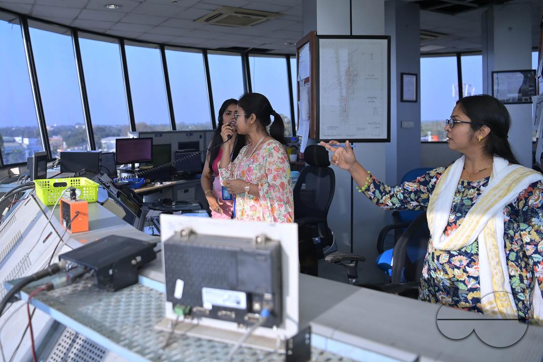 Female traffic controllers, Bipasha Hrangkhawl, Disha Chandra, and Chaya, take charge of traffic management at the Agartala airport's ATCT Tower to celebrate International Women's Day
