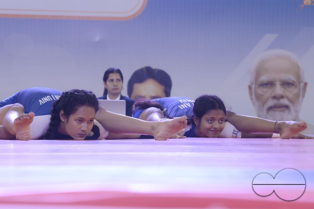 Students of Kalyani University in Orissa perform Yoga at the Khelo India University Games competition