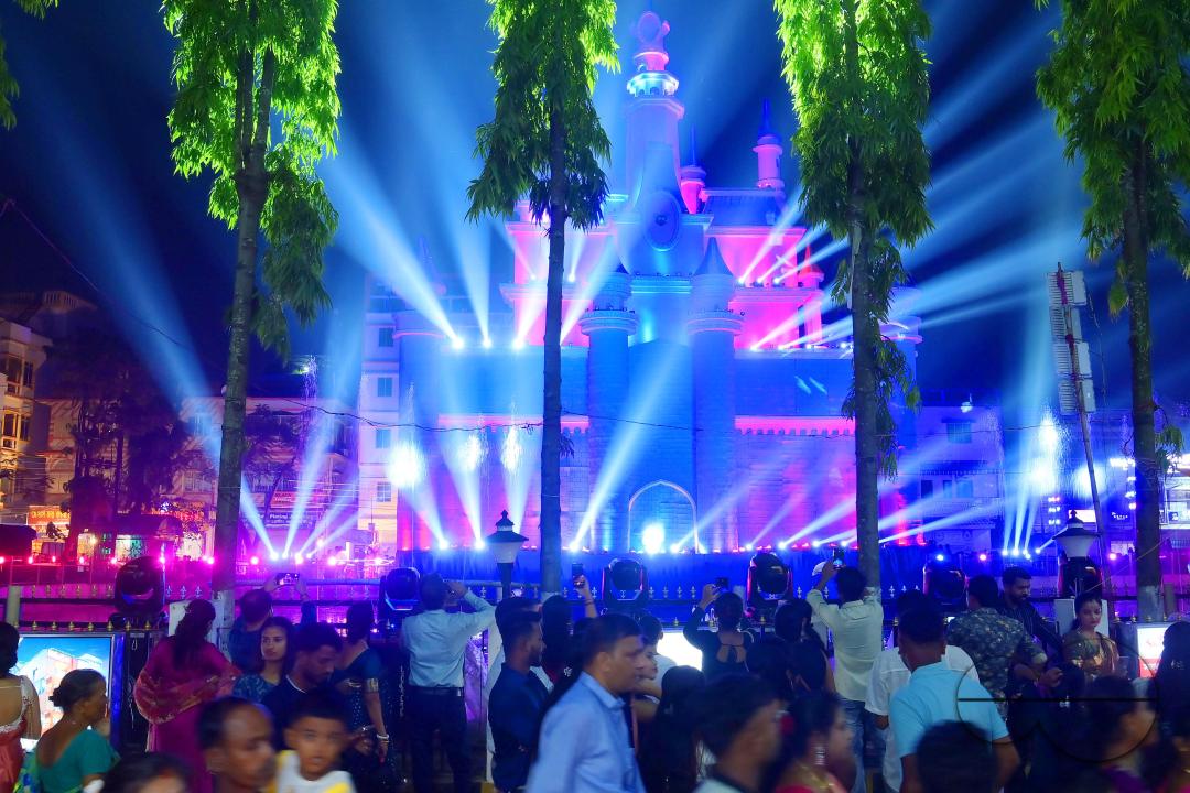 An illuminated "pandal", or temporary platform is seen where the idols of Durga are kept, and the worship of the Mother Goddess Durga is taking place during the Durga Puja festival in Agartala