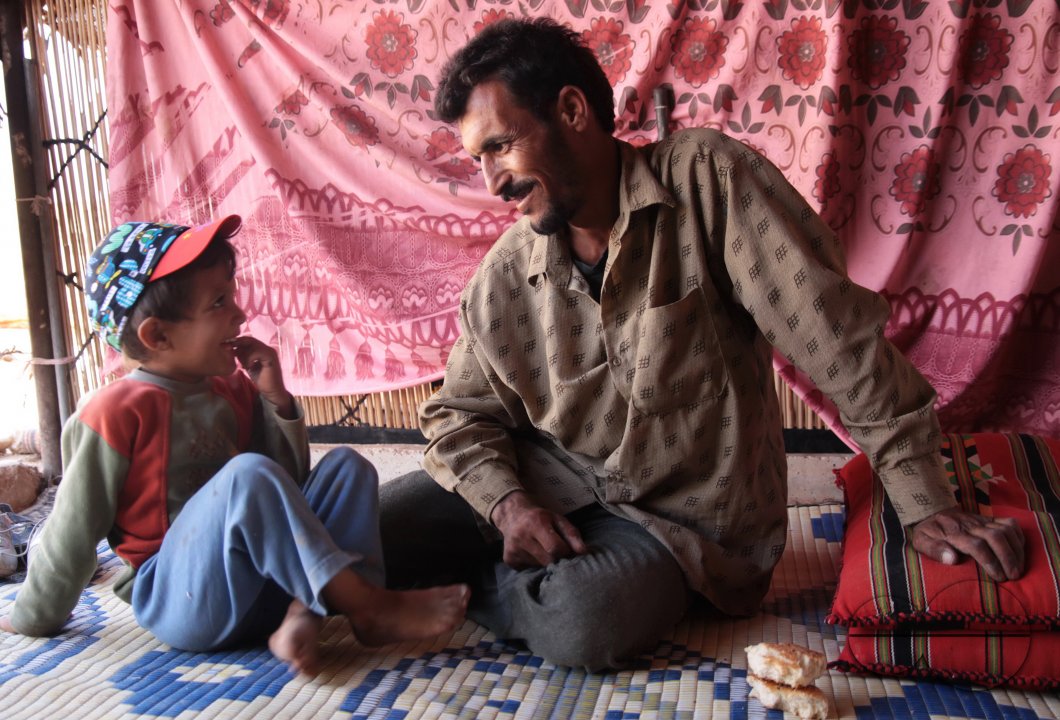 Photo story - Abu Mohammad and His family - the relationships between a poor family how they live.