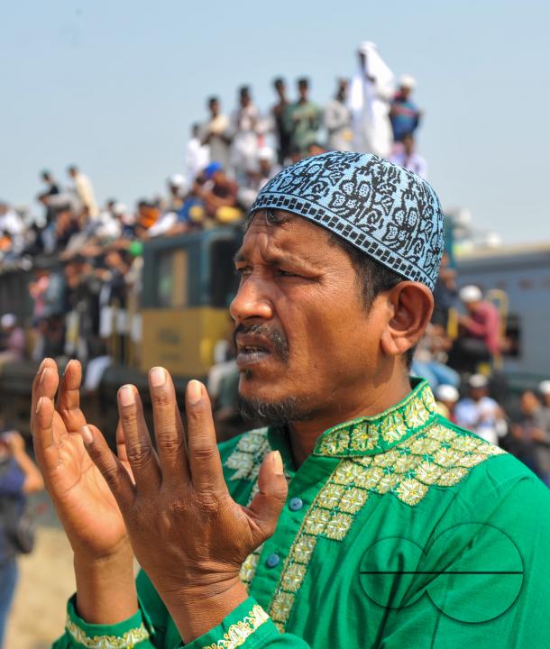Muslim devotees offer prayers at the Akheri Munajat or final prayers during the Biswa Ijtema 2nd phase, an annual congregation of Muslims in Tongi, the outskirts of Dhaka, Bangladesh.
