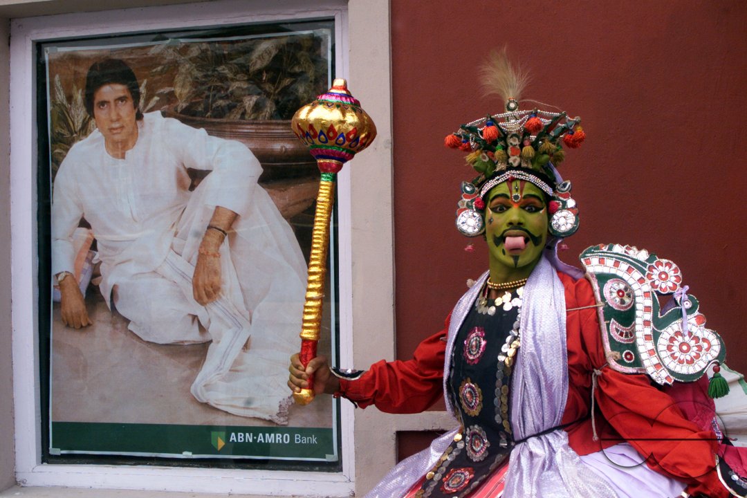 A South Indian dancer acts during a stage show at a dance festival in Kolkata