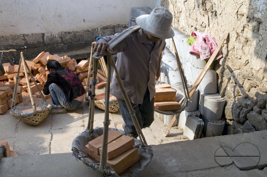 CHINA Migrant workers from the countryside working in construction in Kunming, Yunnan province.