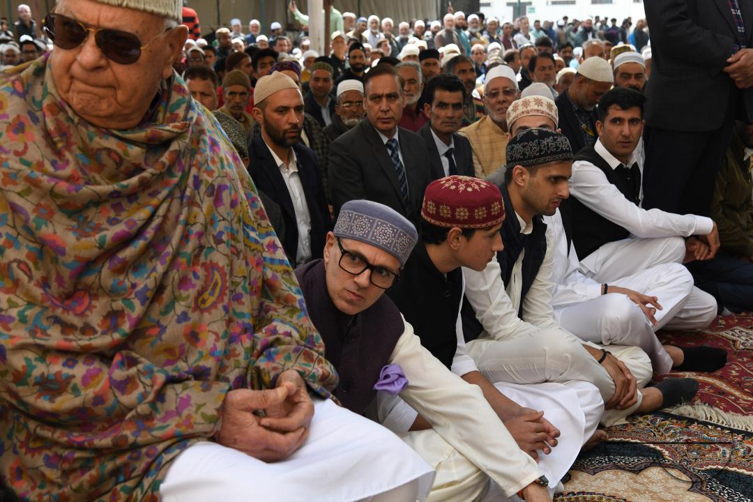 NC President Farooq Abdullah and his son Omar Abdullah offer eid prayers at Hazratbal Shrine in Srinagar