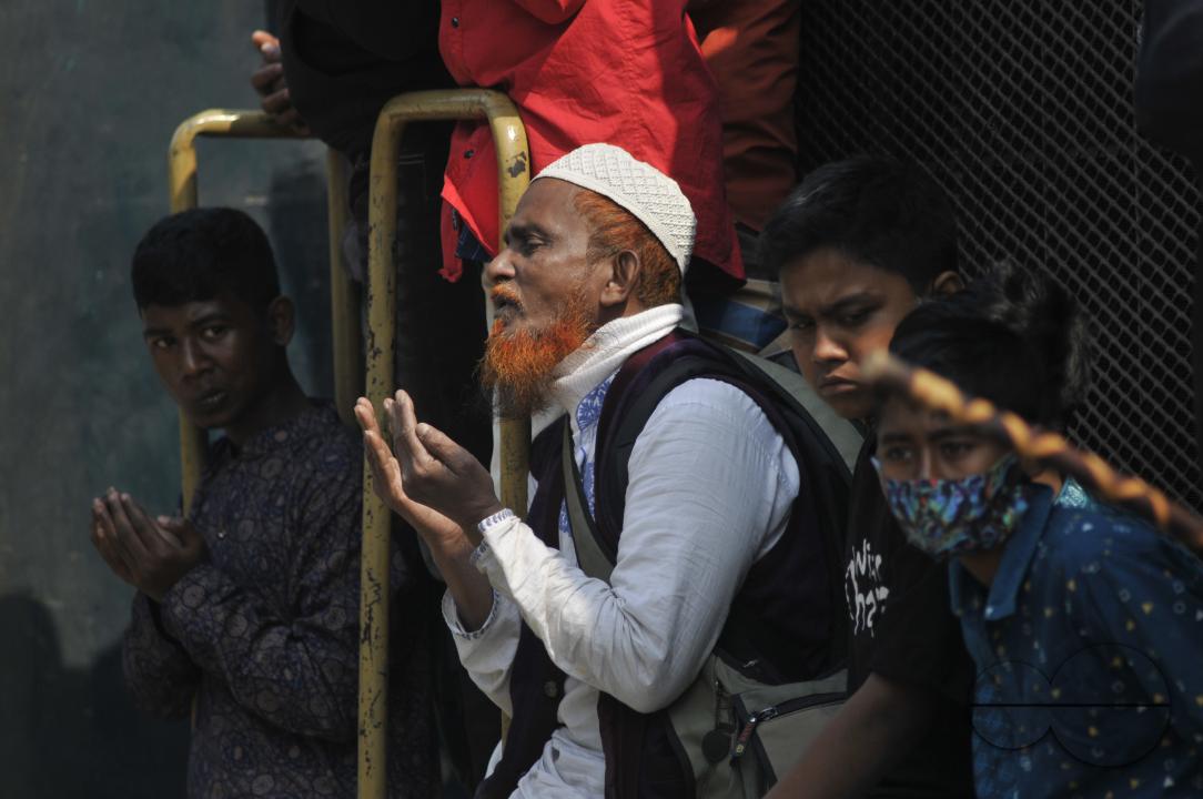 Muslim devotees offer prayers at the Akheri Munajat or final prayers during the Biswa Ijtema 2nd phase, an annual congregation of Muslims in Tongi, the outskirts of Dhaka, Bangladesh.