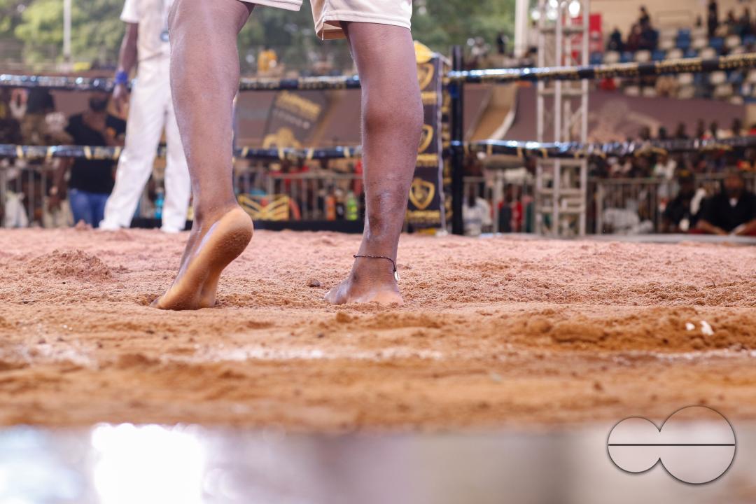 People watch Dambe boxers fight during the Dambe Warriors Supper fight 3 Tournament in Abuja, Nigeria.