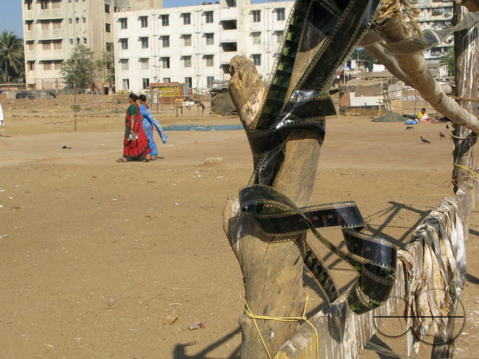 INDIA.Film rushes used to hang clothes to dry in the slums of Mumbai.
