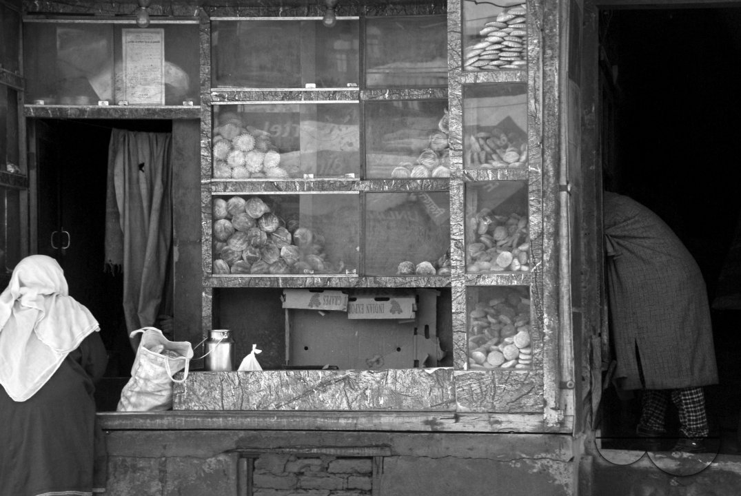 Customers at a local bakery in Kashmir.