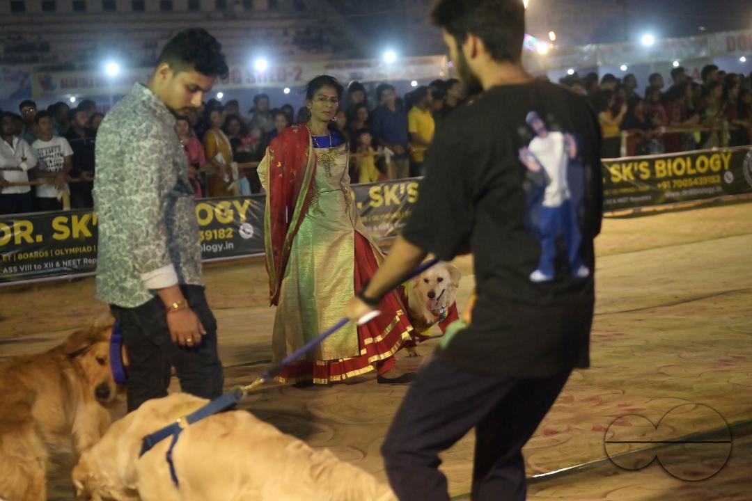 Dogs performing trainers during the Agartala Dog Carnival-2024, organized by Tripura Veterinary Doctors Association & Pawsome (A social organisation) at Agartala