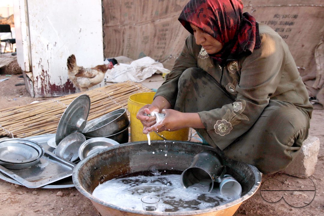 Photo story - Abu Mohammad and His family - the relationships between a poor family how they live.