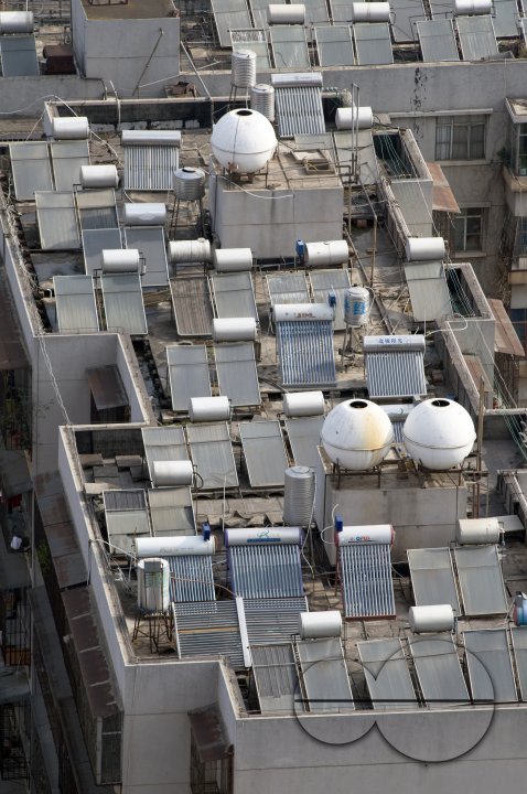 CHINA Solar panels installed on roofs of apartment buildings and offices in Kunming, Yunnan province.