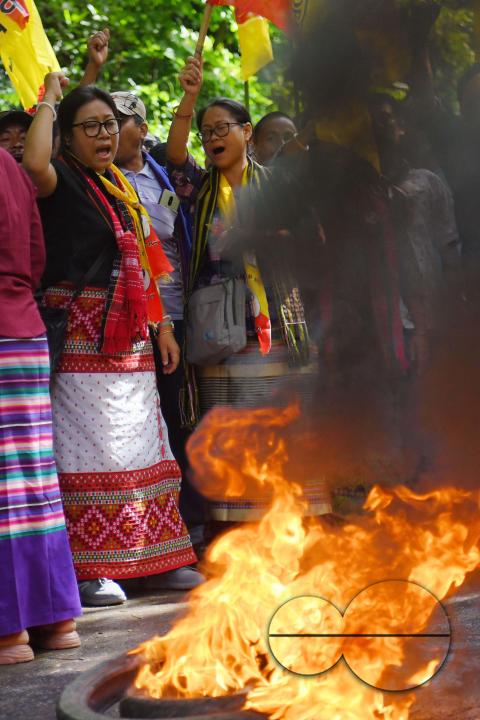 The âTipraha Indigenous Progressive Regional Alliance (TIPRA)ââ supporters raise slogans demanding a separate Greater Tipraland state for tribals, in Bermuda Ashram Para
