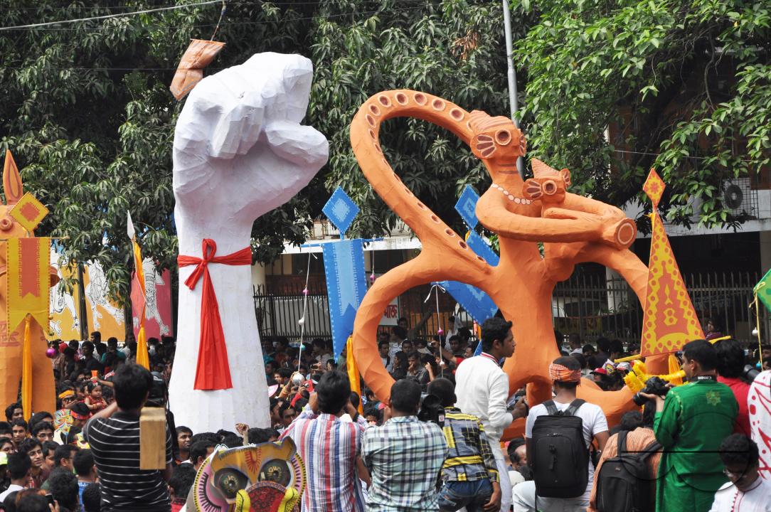 People celebrating in a colorful parade on the streets as a part of New year celebrations