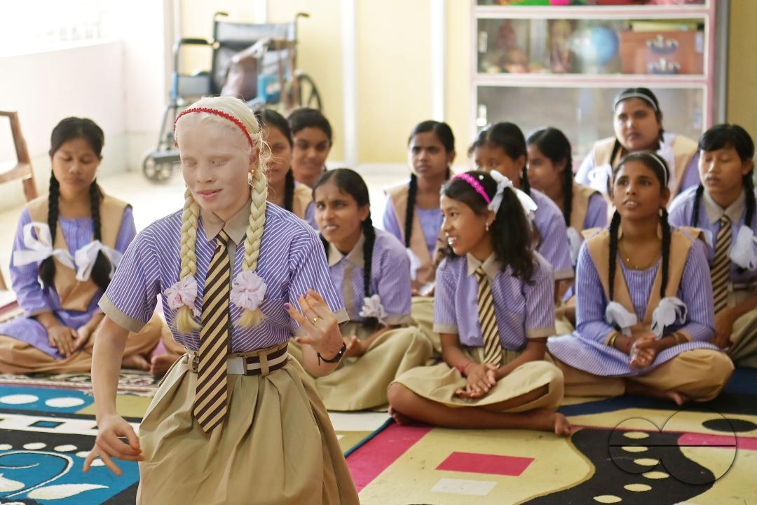 A student at the Institute for Visually Handicapped is performing a dance during the 'Children's Day' celebration at the institute's campus in Narsingarh, in Agartala